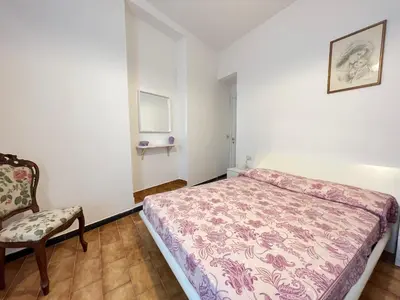 Letto o letti in una camera di Casa Eleonora