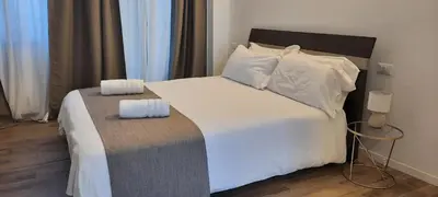 Letto o letti in una camera di R & A Minerva Suites