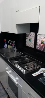 Cucina o angolo cottura di Casa Guen Parma