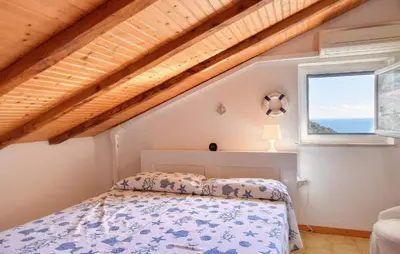 Letto o letti in una camera di Amazing Apartment In Moneglia