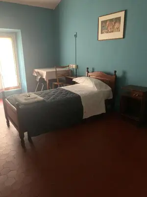 Letto o letti in una camera di Leon doro