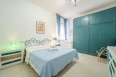 Letto o letti in una camera di GuestHost - Relax in Luguria
